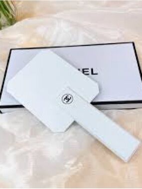 CHANEL White Handheld Mirror with Black Logo Accent